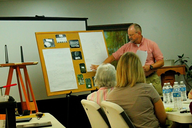 Picture of presentation on cemetery mapping